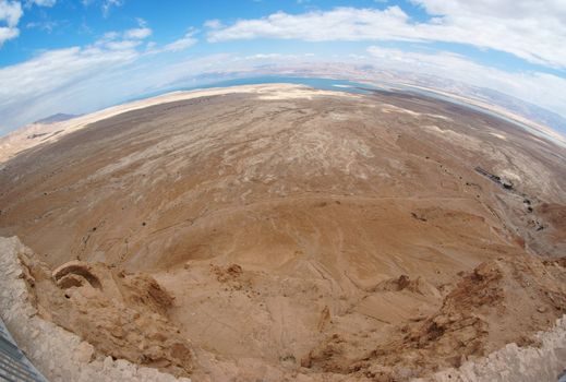 Fisheye view of desert landscape near the Dead Sea seen from Masada fortress
