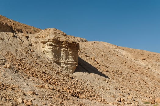Scenic rock in stone desert near Dead Sea in Israel