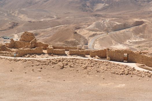 Ruins of ancient Masada fortress in the desert near the Dead Sea