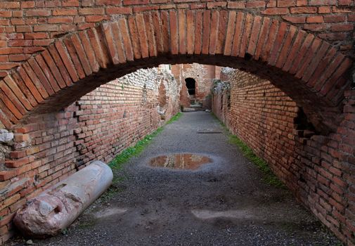 Ancient brick arch under the Roman theater in Taormina, Sicily, Italy