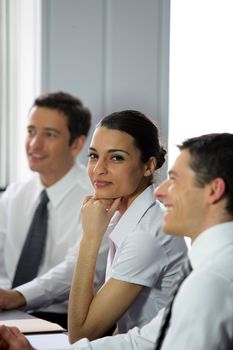 Woman participating in a business meeting