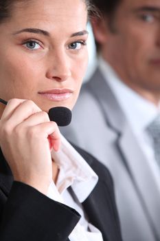 close-up of a woman with headset