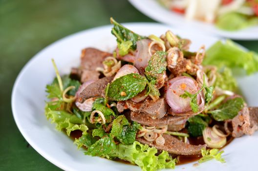 mixed  fresh vegetable and steamed liver , Thai spicy salad