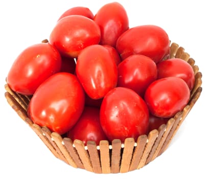 fresh tomatoes in a basket on a white background