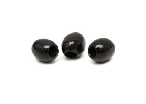 Three black olives shot on white background 