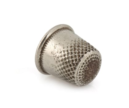 Silver thimble isolated on white background