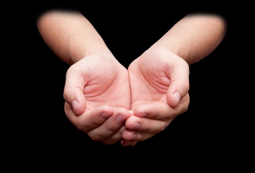 Hands isolated on black background 