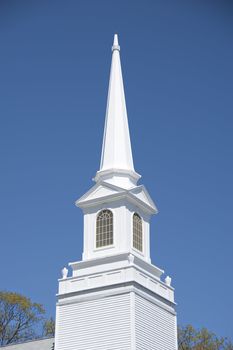 Church steeple in white in old New England church
