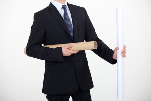 Businessman with a roll of paper