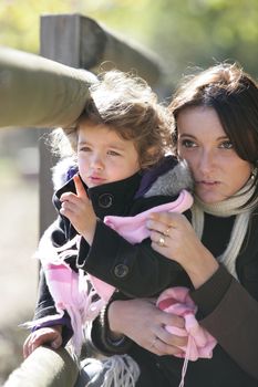 Woman and daughter outdoors