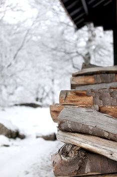 Woodpile outside a cabin