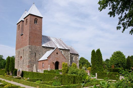 Outdoor view of Fjenneslev church in Denmark, which is famous for its indoor wall paintings