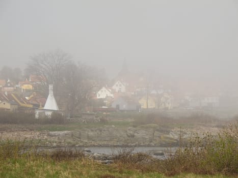 Svaneke on Bornholm in dense sea fog, Denmark