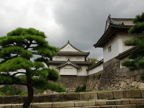Old japanese buildings along the fortification around osaka castle