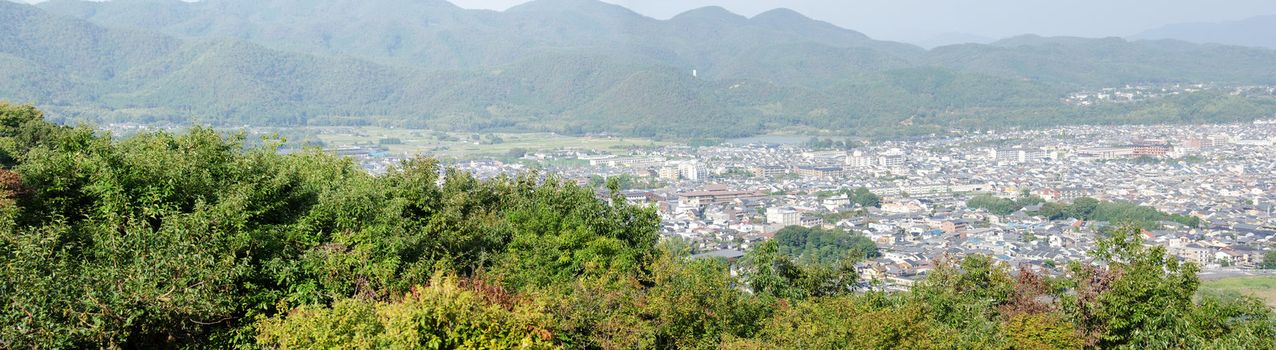 Panorama view of Arashiyama, Kyoto, Japan from a surrounding mountain