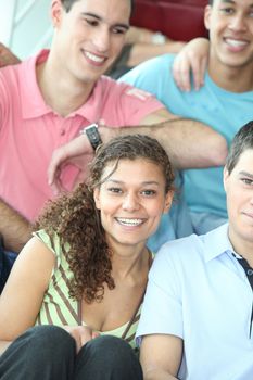 Group of teenage friends sat together