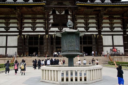 Entrance doors and lantern in front of the Great Buddha Hall, daibutsuden, of the Todai-ji buddhist temple in Nara, Japan