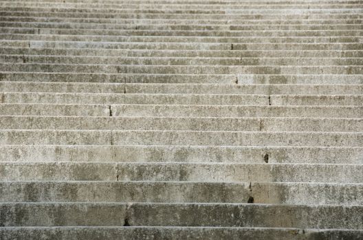 Background pattern of stairs out of stone leading upwards