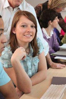 Students using computers in class