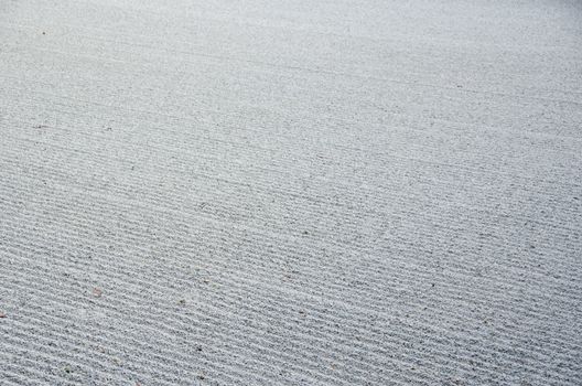 Background pattern of gravel in a japanese zen stone garden