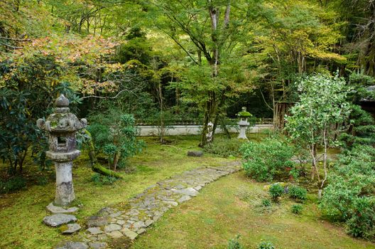 Japanese garden with lantern and stone pathway