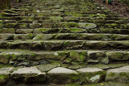 Background pattern of old stone stairs leading upwards