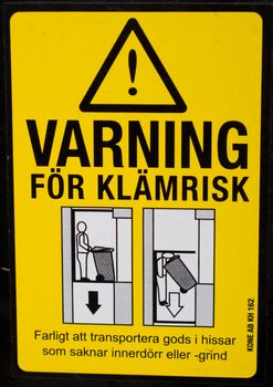 swedish danger sign varning for klamrisk, elevator