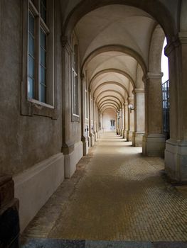 Light colored arcade, archway with perspective feeling