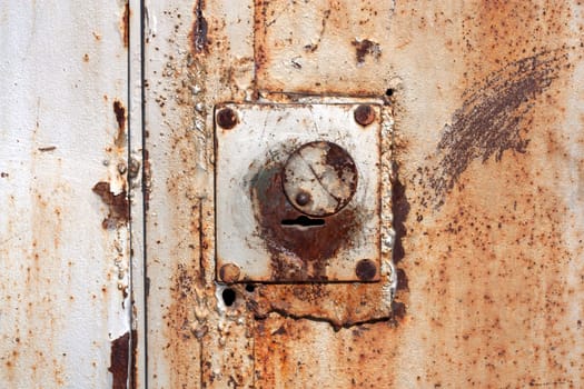 Old padlock on garage collars 