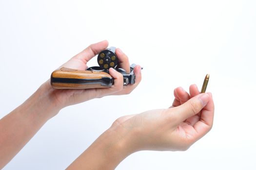 Woman's Hand With bullet 22  and revolver hand gun and Isolated On White Background