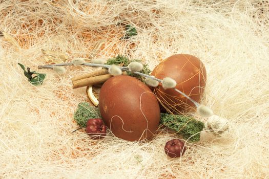 Happy Easter design with eggs in a nest