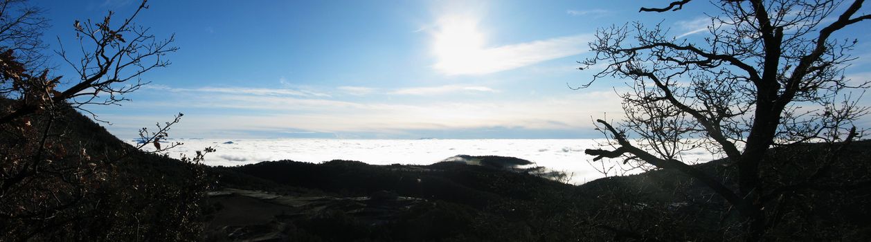 panorama taken in the pyrenees with clouds under your feet