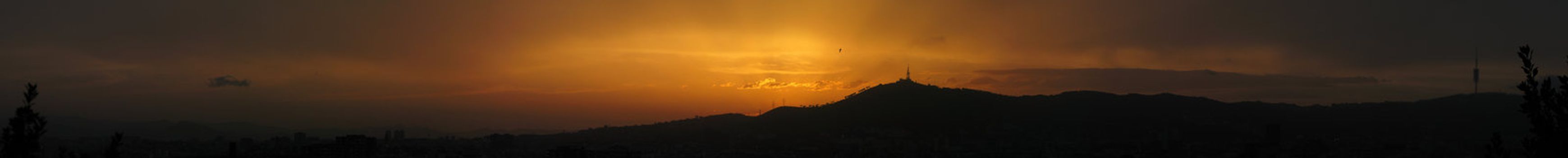 Panorama view of the mountains around Barcelona with sunset