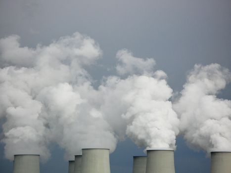cooling towers of a coal power plant, white steam