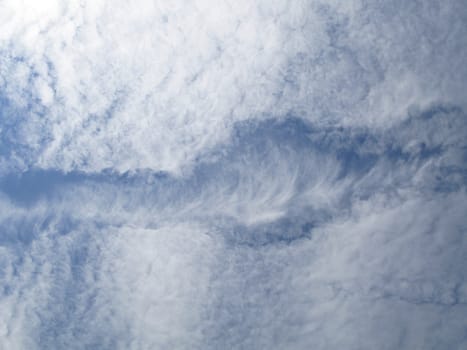 homogenous clouds disturbed by a plane, sky pattern