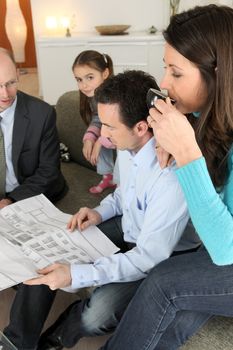 Family having a meeting with their architect