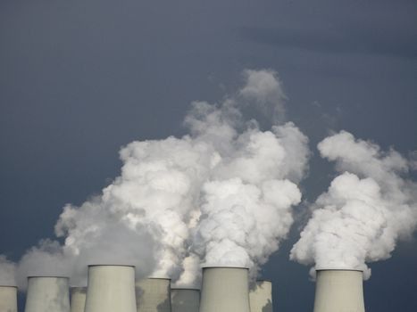 cooling towers of a coal power plant, white steam
