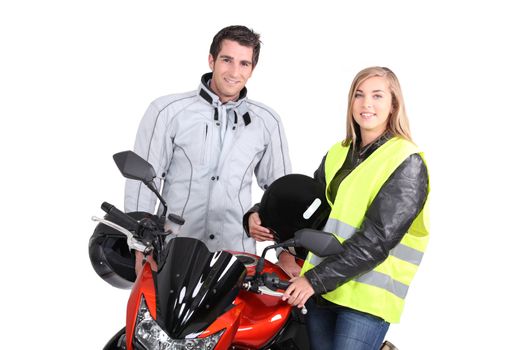 portrait of young people with motorbike