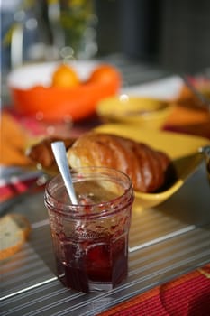 Jam pot on a breakfast table