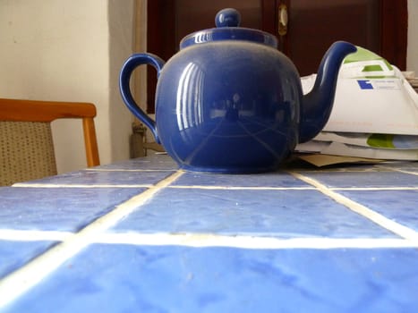 dusty blue teapot as a background