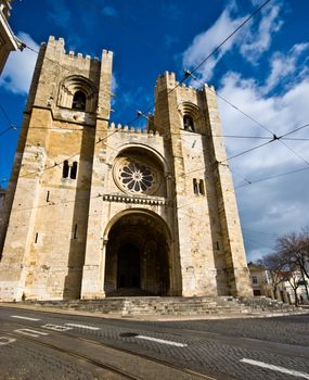 facade of the cathedral in Lisbon from below