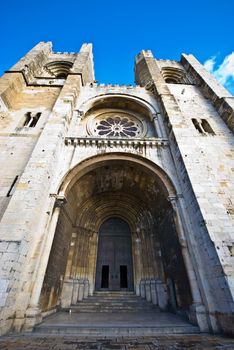facade of the cathedral in Lisbon from below