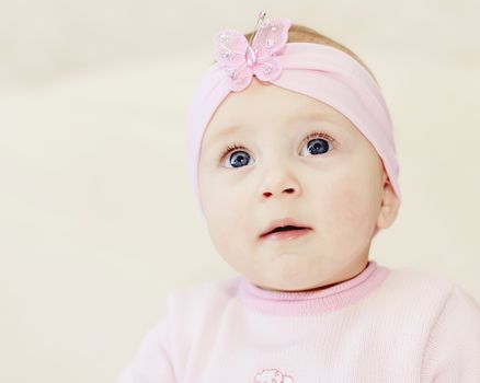 bright closeup portrait of adorable baby girl