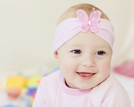 bright closeup portrait of adorable baby girl