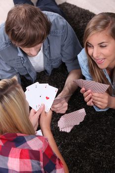 Teen playing cards