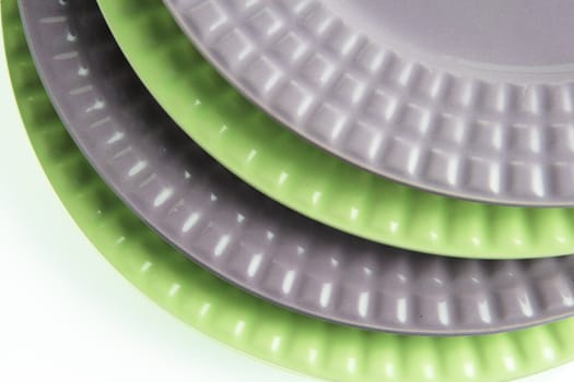 Pile of gray and green plates