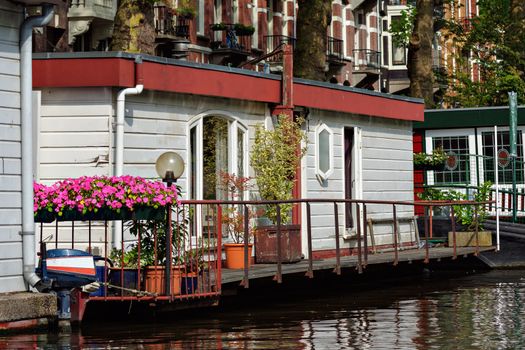 These canal homes line the intricate network of canals that run through the heart of Amsterdam, Netherlands.