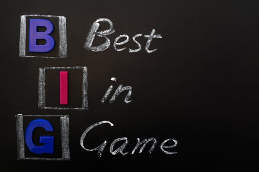 Acronym of BIG - Best in Game written on a blackboard