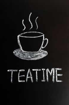 Chalk drawing of teatime with a cup on a blackboard