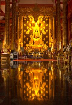 Golden buddha statue image in Phare Temple Thailand